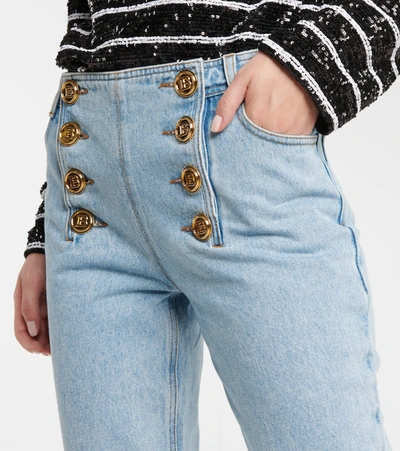 Shop Balmain Embellished Low-rise Flared Jeans In Blue