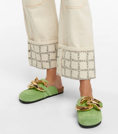 Shop Jw Anderson Embellished Suede Slippers In Green