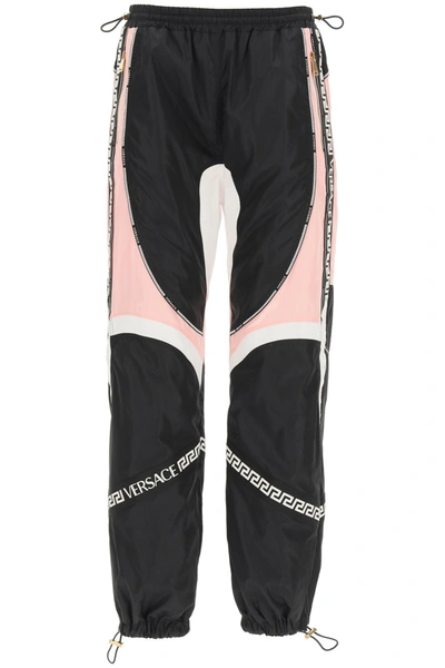 Shop Versace Greca Tape Sweatpants In Multi