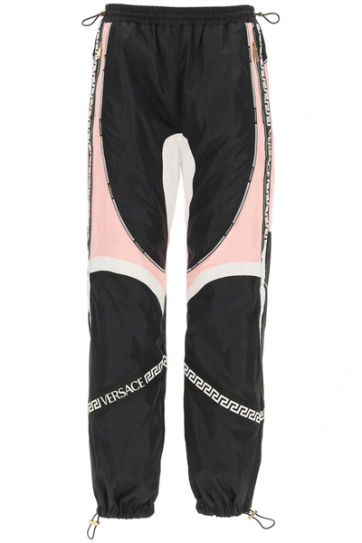 Shop Versace Satin And Nylon Jogger Pants In Mixed Colours
