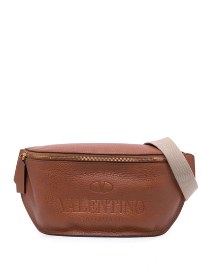 Shop Valentino Embossed-logo Belt Bag In Braun