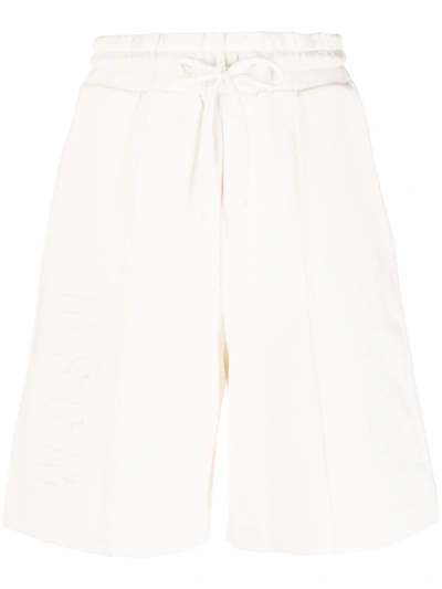 Shop Msgm Logo-embossed Shorts In Nude