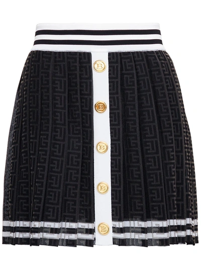 Shop Balmain Black Pleated Monogram Jacquard Skirt In White/black