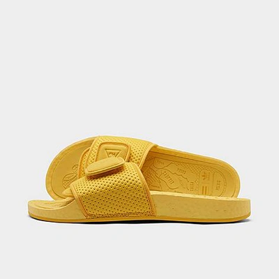 Shop Adidas Originals X Pharrell Williams Chancletas Hu Slide Sandals In Bold Gold/bold Gold/bold Gold