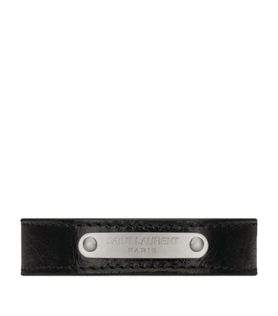 Shop Saint Laurent Leather Logo-detail Bracelet In Black