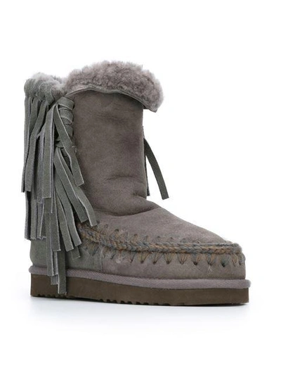 Shop Mou Fringed Shearling Boots