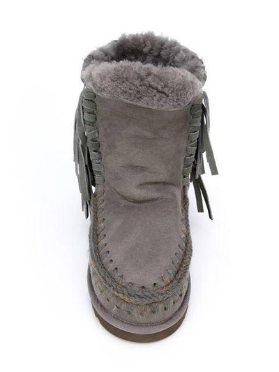 Shop Mou Fringed Shearling Boots