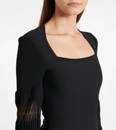 Shop Alaïa Stretch-knit Bodysuit In Black