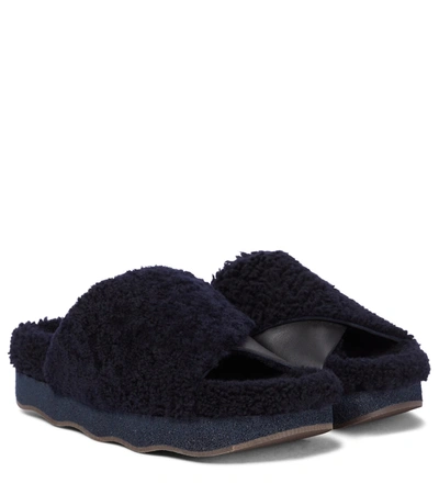 Shop Chloé Wavy Shearling Slides In Black