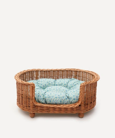 Shop Coco & Wolf Amelie Oval Rattan Dog Bed In Blue