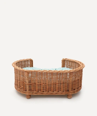 Shop Coco & Wolf Amelie Oval Rattan Dog Bed In Blue