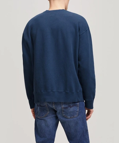 Shop Nudie Jeans Lukas Round Logo Sweater In Indigo Blue