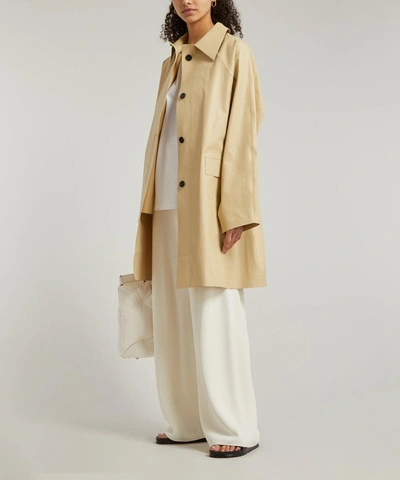 Shop Kassl Editions Above The Knee Coated Trench Coat In Sand