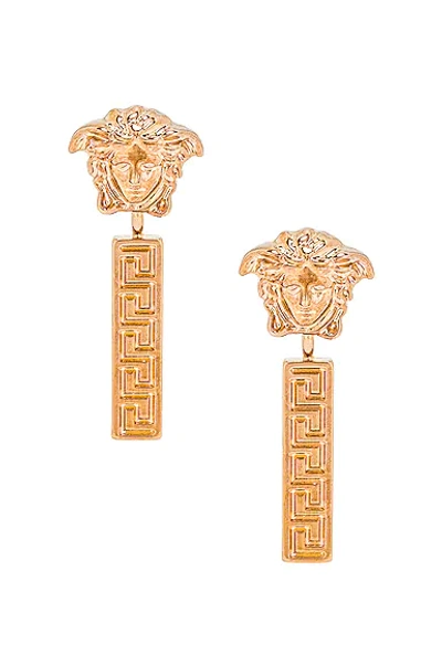 Shop Versace Medusa Greca Earrings In Oro