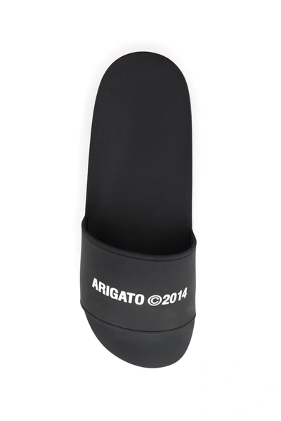 Shop Axel Arigato Rubber Slides In Black