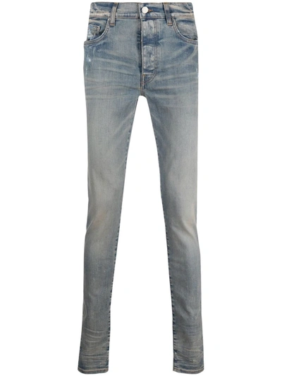 Shop Amiri Washed-effect Skinny Jeans In Blue