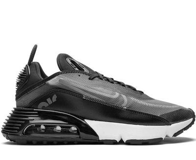 Shop Nike Air Max 2090 Sneakers In Black