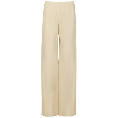 Shop The Row Gala Cream Wide-leg Trousers In Off White