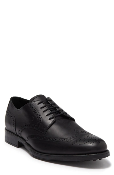 Shop Tod's Fondo Wingtip Leather Derby In Black