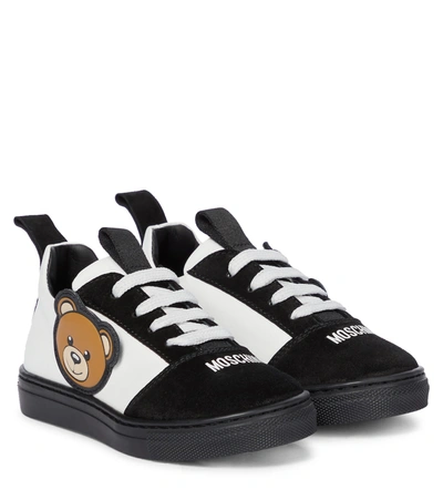 Shop Moschino Leather Sneakers In White