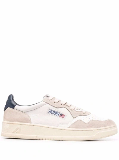 Shop Autry Leather Sneakers With Suede Inserts In White