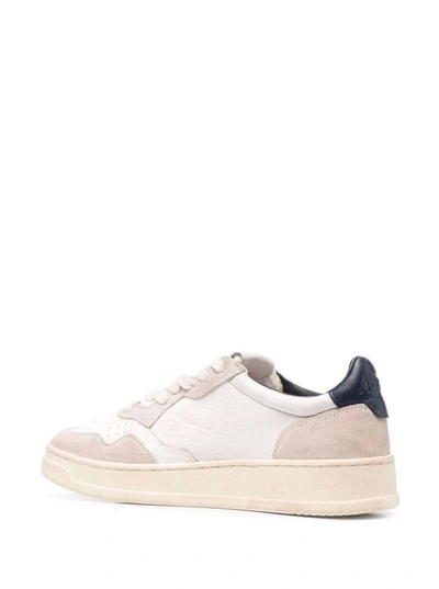 Shop Autry Leather Sneakers With Suede Inserts In White