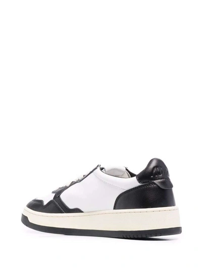 Shop Autry White And Black Leather Sneakers In White/black
