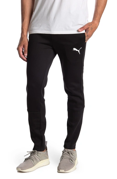 Shop Puma Evostripe Core Pants In  Black