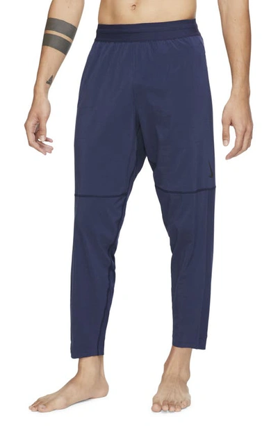 Shop Nike Natural Movement Pocket Yoga Pants In Midnight Navy/ Black