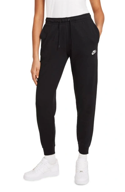 Shop Nike Sportswear Essential Fleece Pants In Black/ White