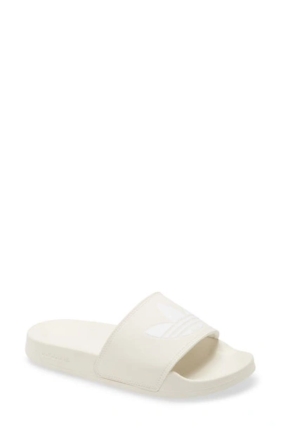 Shop Adidas Originals Adilette Comfort Slide Sandal In Off White/ White/ Off White