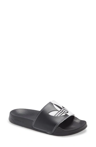 Shop Adidas Originals Adilette Comfort Slide Sandal In White/ Core Black/ White