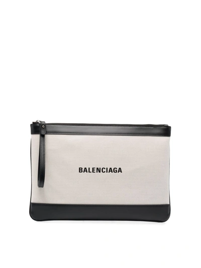Shop Balenciaga Logo-print Canvas Clutch Bag In Neutrals