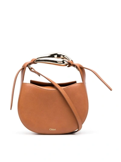 Shop Chloé Small Kiss Crossbody Bag In Brown