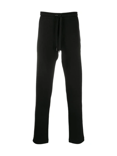 Shop Dolce & Gabbana Dg Crest Print Track Pants In Black