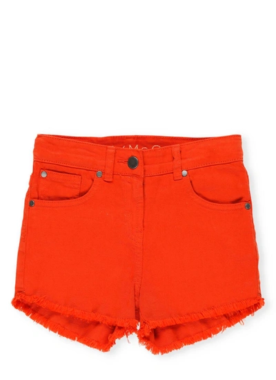 Shop Stella Mccartney Kids Raw Hem Denim Shorts In Red