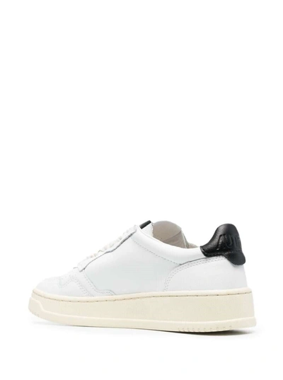 Shop Autry White Leather Sneakers With Black Heel Tab In White/black