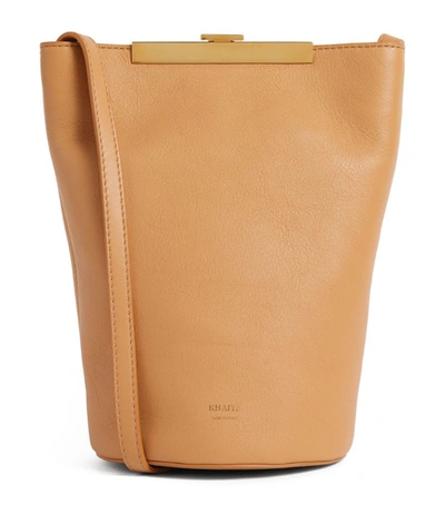 Shop Khaite Leather The Etta Cross-body Bag In Beige