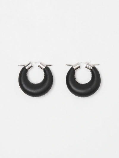 Shop Burberry Spike Detail Topstitched Leather Hoop Earr In Palladium/black