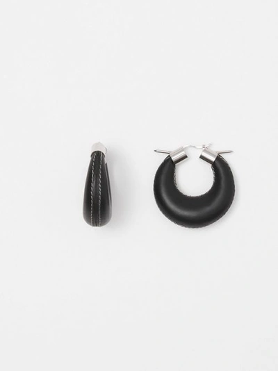 Shop Burberry Spike Detail Topstitched Leather Hoop Earr In Palladium/black