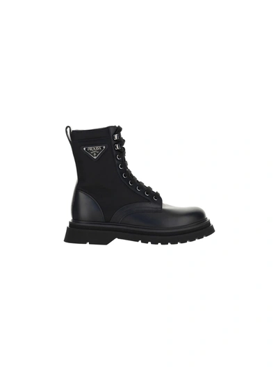 Prada Logo-plaque Panelled Ankle Boots In Black