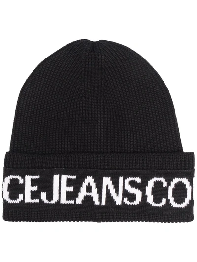 Shop Versace Jeans Couture Logo Embroidered Beanie Hat In Schwarz