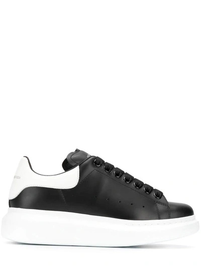 Shop Alexander Mcqueen Oversized Black Trainers With White Detailing On The Heel In Nero