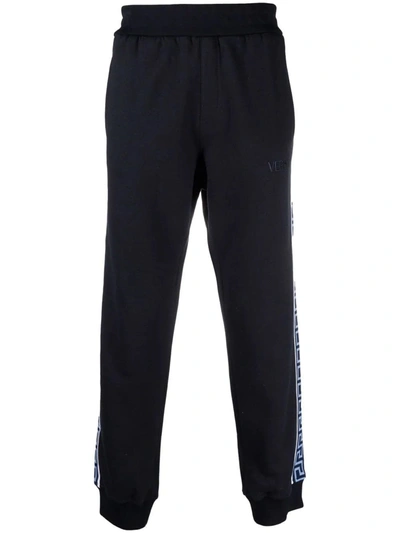 Shop Versace Blue Greca Trim Sports Trousers