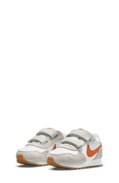 Shop Nike Md Valiant Sneaker In White/ Orange/ White/ Sail