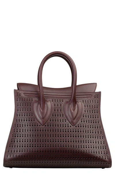 Shop Alaïa Sidi Vienne Perforated Leather Satchel In Almandite