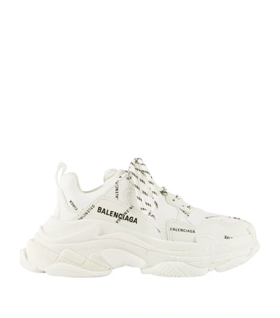 Shop Balenciaga All-over Logo Triple S Sneakers In White