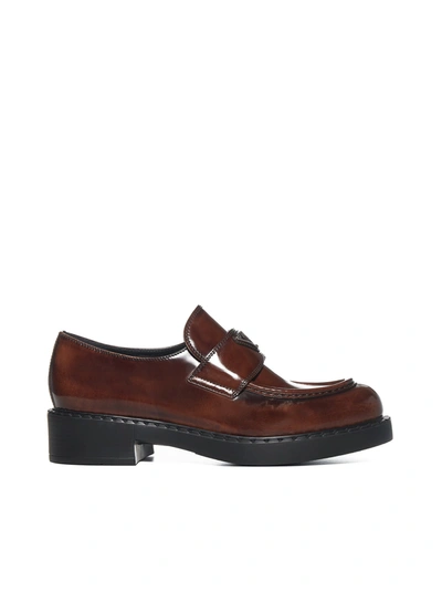 Shop Prada Triangle Logo Penny Loafers In Brown