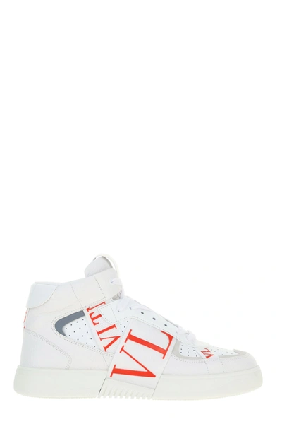 Shop Valentino Vltn High Top Sneakers In White