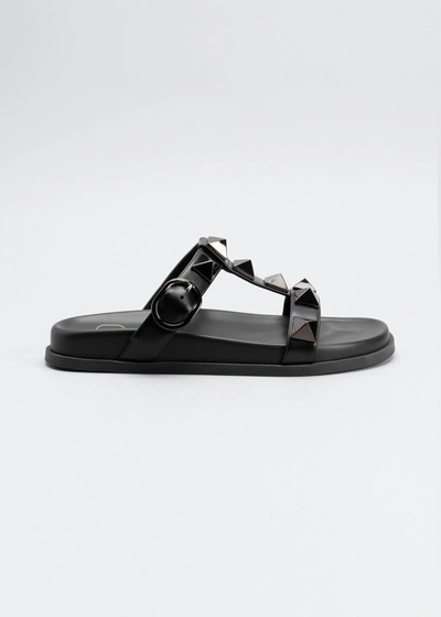 Shop Valentino Roman Stud T-strap Slide Sandals In Black